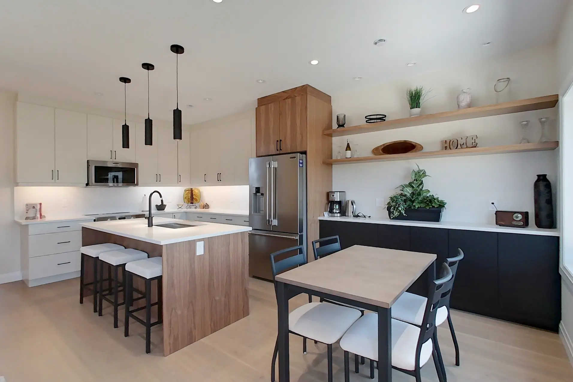 Kitchen with wood-look island, open shelving and pendant lights